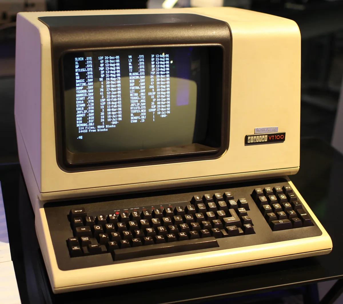 A DEC VT100 video terminal from the late 1970s showing a directory listing on its screen